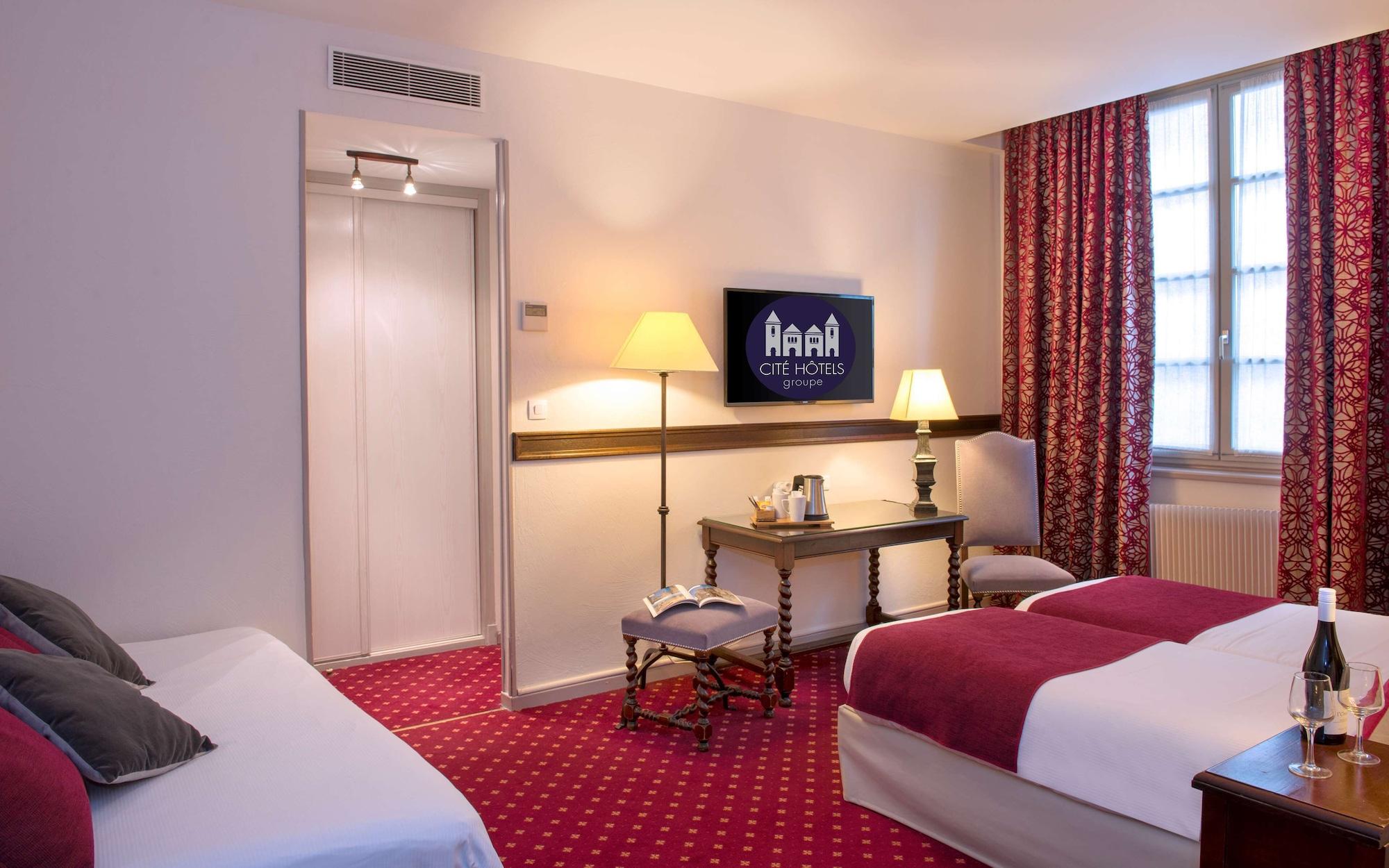 เบสต์ เวสเทิร์น เลอ ดงฌง เล ร็องปาร์ต Hotel การ์กาซอน ภายนอก รูปภาพ