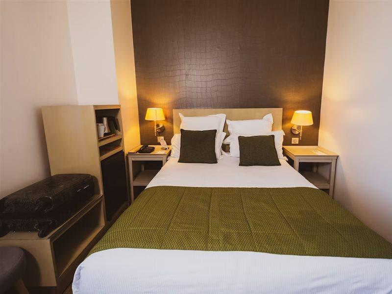 เบสต์ เวสเทิร์น เลอ ดงฌง เล ร็องปาร์ต Hotel การ์กาซอน ภายนอก รูปภาพ